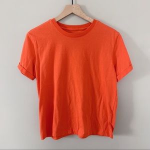orange tee shirt